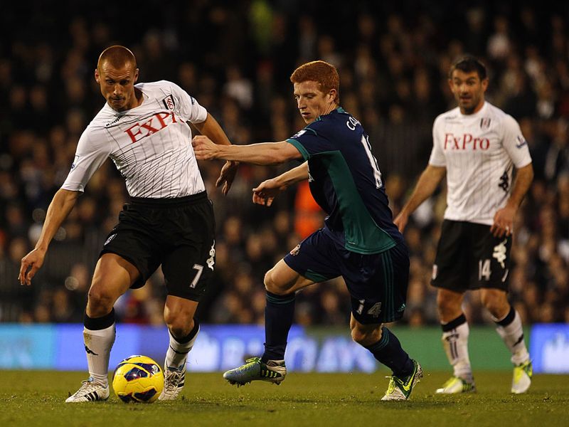 Steve Sidwell tries to wriggle away from Jack Colback as Fulham fight on with ten men.