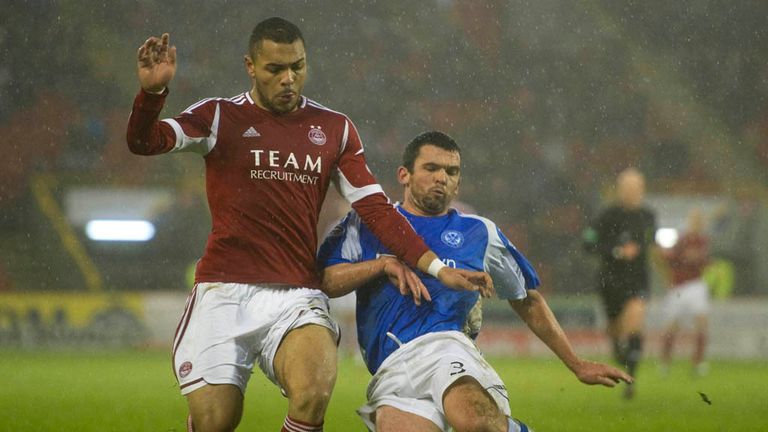 Magennis and Davidson: Battle for the ball