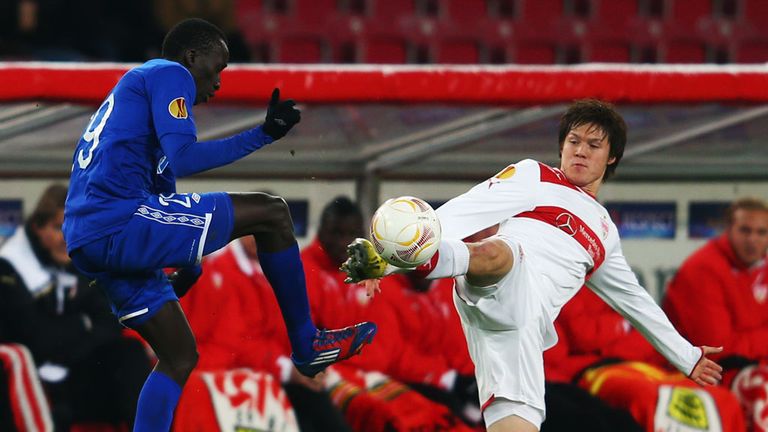Pape Pate Diouf and Gotoku Sakai battle for possession