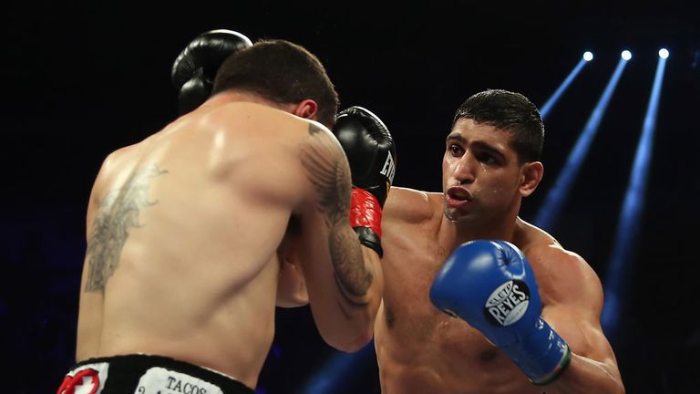 Amir Khan: won his first bout with new trainer Virgil Hunter in his corner