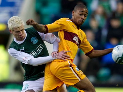 Ryan McGivern and Chris Humphrey battle for the ball