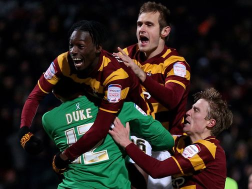 Bradford celebrate their penalty shoot-out victory
