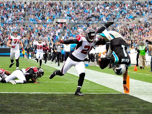 Newton makes a spectacular entrance into the end zone