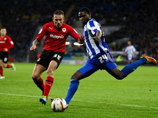 Craig Bellamy tries to stop Jeremy Helan.