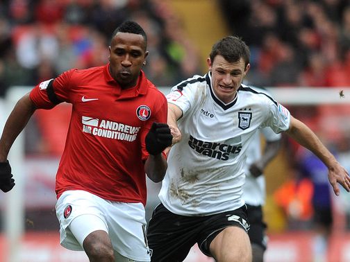 Ricardo Fuller holds off Tommy Smith