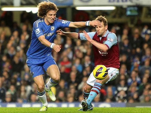 David Luiz and Brett Holman do battle