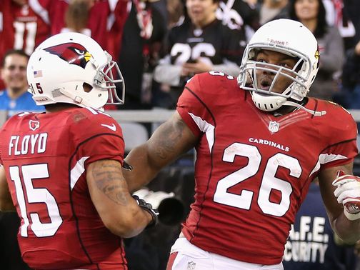 Michael Floyd and Beanie Wells celebrate a touchdown