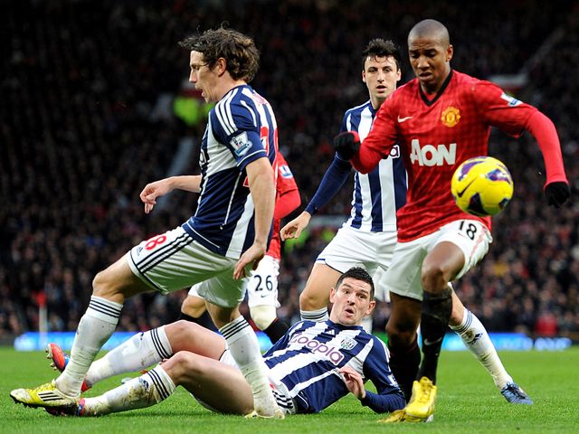 Ashley Young probes for an opening