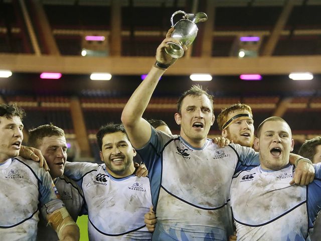 Glasgow skipper Alastair Kellock lifts the 1872 Cup