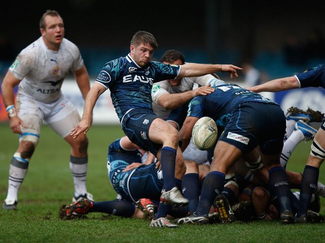 Lewis Jones of Cardiff kicks for touch