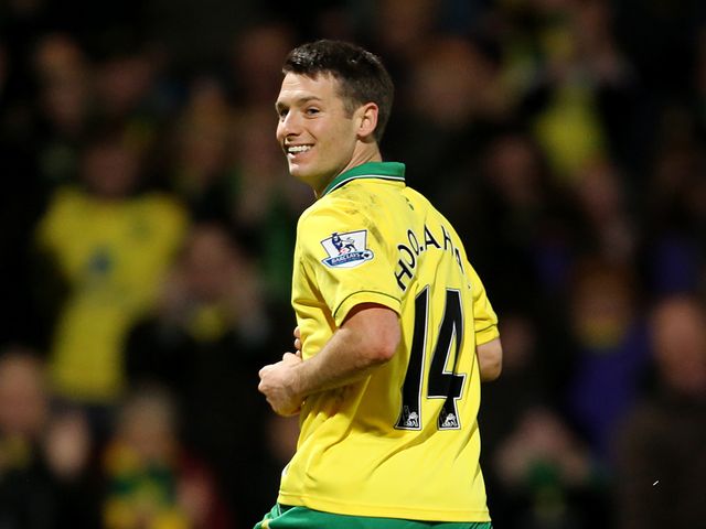 Wes Hoolahan smiles after scoring