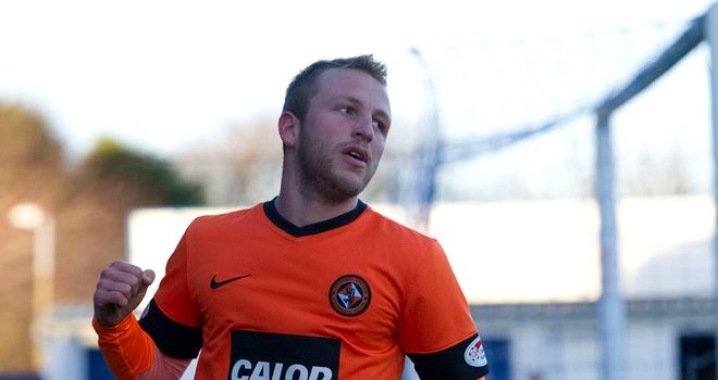 Johnny Russell: Celebrates one of his goals for United