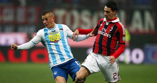 Vladimir Weiss is challenged by Mattia De Sciglio