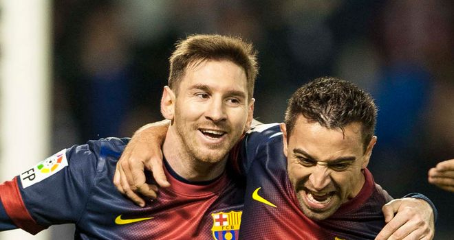 Barcelona joy: Lionel Messi and Xavi scored as the leaders beat Real Valladolid 3-1