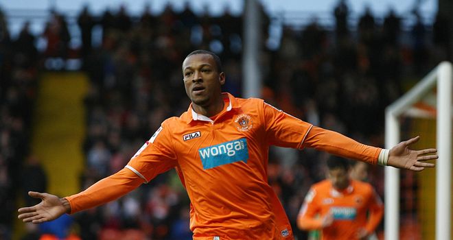 Wes Thomas: Celebrates his opener for Blackpool
