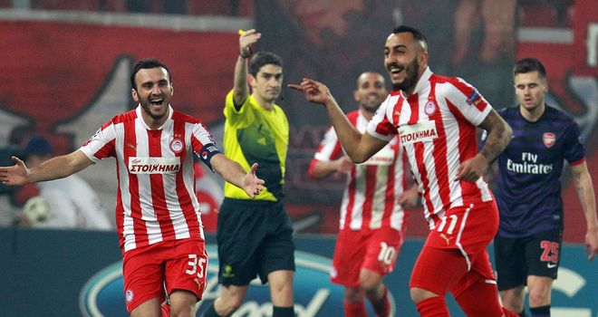 Kostas Mitroglou: Celebrates his winner against Arsenal