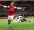 Theo Walcott staked his claim for a striking role with a Christmas hat-trick