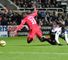 Papiss Cisse takes a tumble under the challenge of Maynor Figueroa