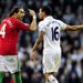 Tempers flare in injury time as Chico takes exception to the fact Tottenham played on when Michu was flat out with a head injury