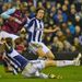 Jonas Olsson's sliding challenge stopped Cole in his tracks