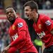Evra wheels away to celebrate his goal at the Liberty Stadium