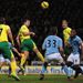 Norwich are offered some hope when Snodgrass' cross is headed back across goal by Bassong and Russell Martin is on-hand to head home.
