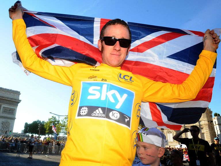 Sir Bradley Wiggins in the yellow jersey last year