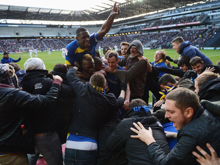 AFC Wimbledon can celebrate victory at Accrington.