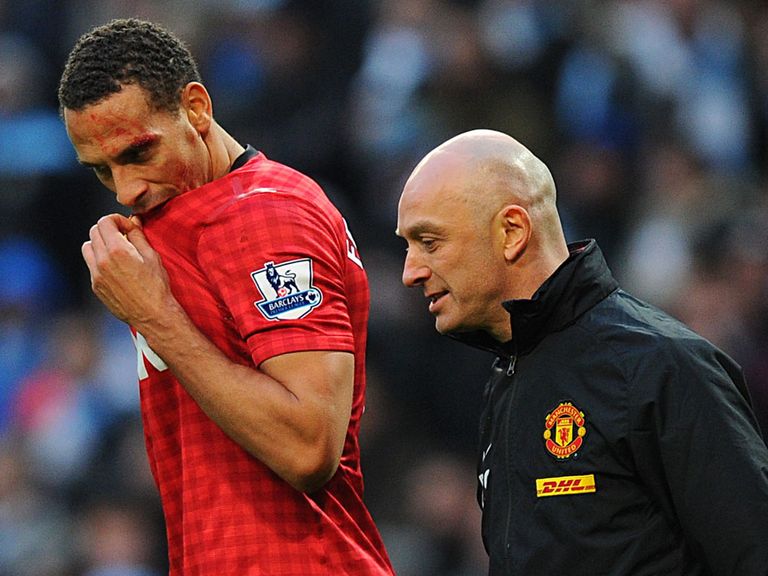 Blood is visible on Rio Ferdinand's face