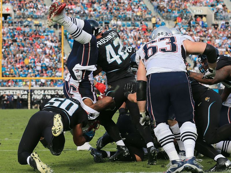 Brandon Bolden is upended during the Patriots' victory over the Jaguars