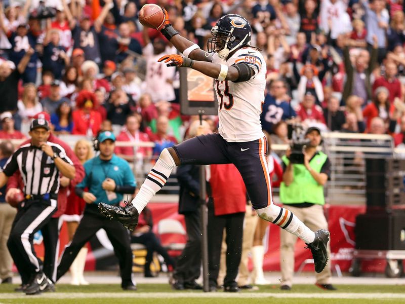 Charles Tillman returns an interception for a touchdown in the Bears' win over the Cardinals