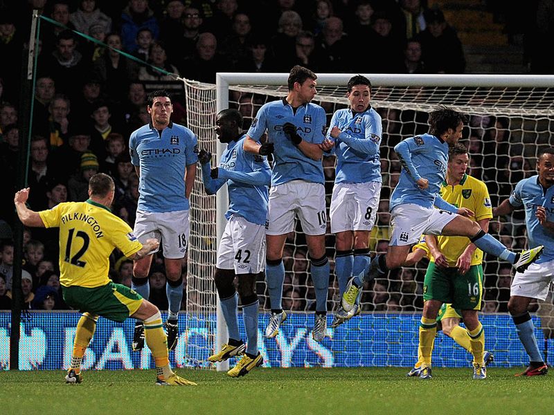Norwich grab a goal back against Man City, Anthony Pilkington's free-kick deflects off Gael Clichy to wrong-foot Joe Hart.