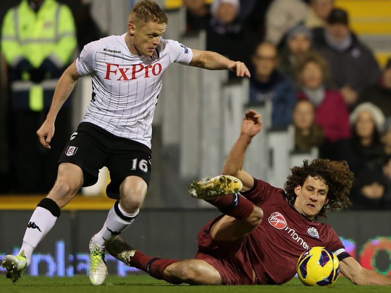 Newcastle were still on the back foot in the first half as Fabricio Coloccini slid in on Damien Duff.