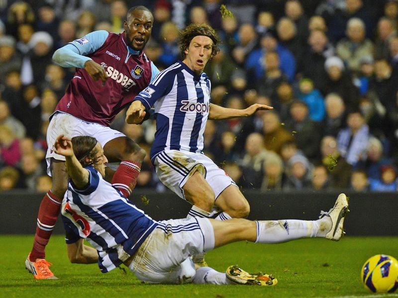Jonas Olsson's sliding challenge stopped Cole in his tracks