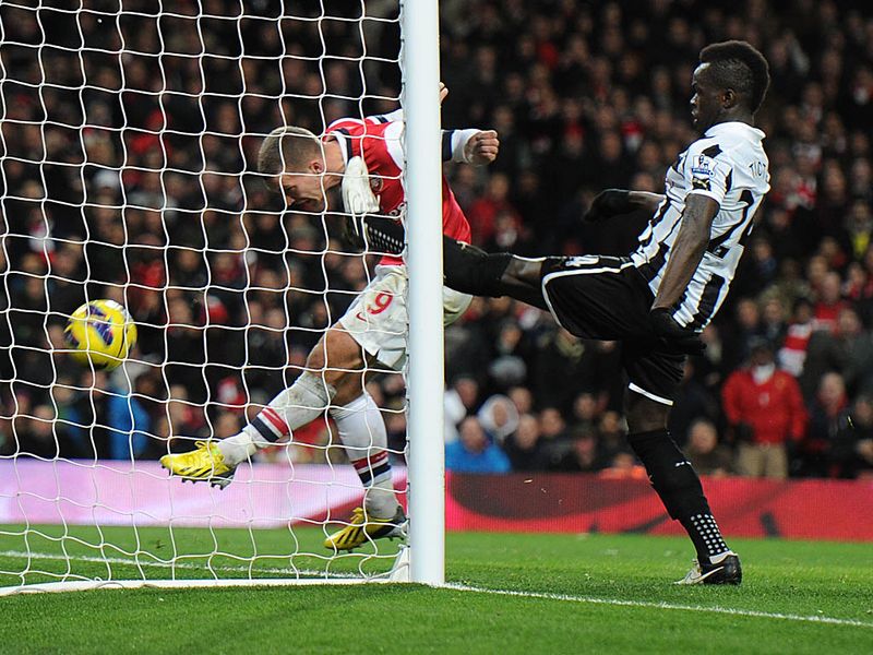 Four minutes later Arsenal are ahead again. Jack Wilshere uses his strength to get to the byline and chips a cross which falls to Lukas Podolski.