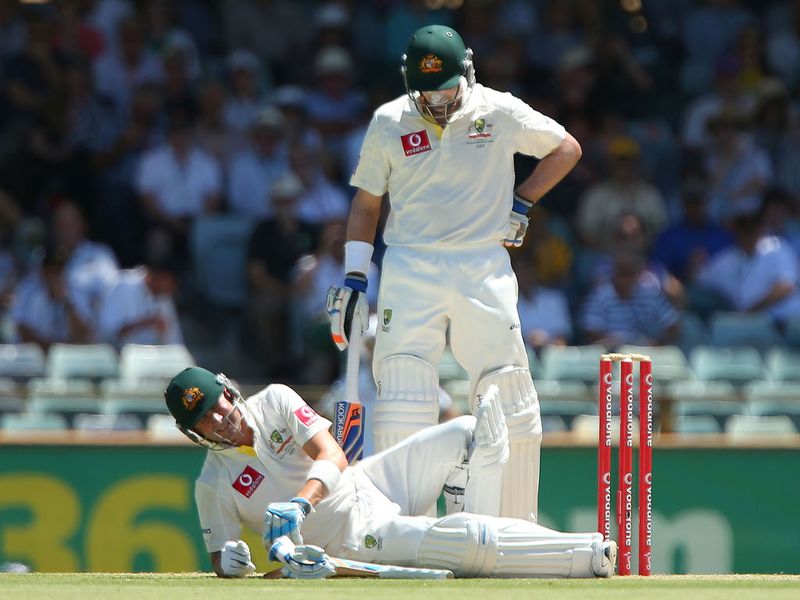 Mike Hussey looked on in concern as Michael Clarke suffered after being struck in the groin.