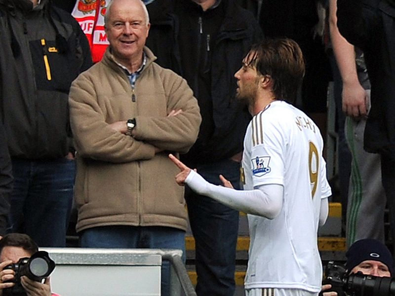 Michu celebrates in front of the United fans
