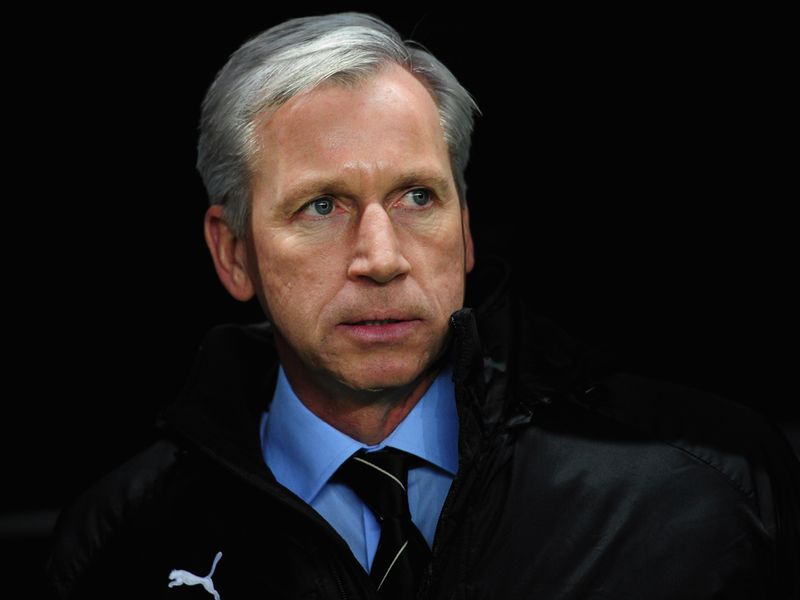 Newcastle boss Alan Pardew watched the action.