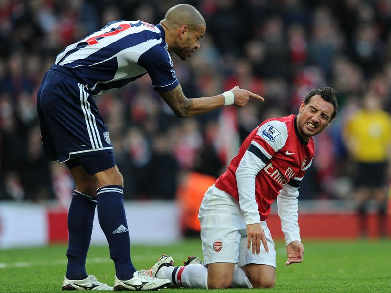 On 25 minutes Arsenal are awarded a penalty when Cazorla cuts inside and goes down in the box. Reid accuses Santi of diving and could have a good case.