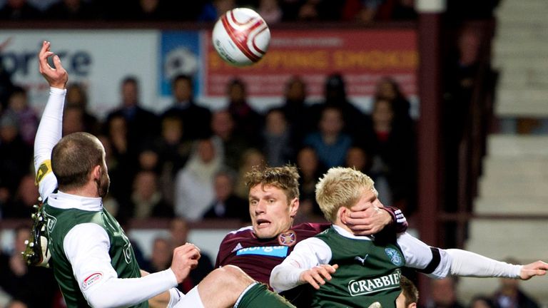 Marius Zaliukas: Sandwiched between Hibs defenders at Tynecastle