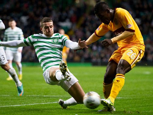 Adam Matthews tackles Zaine Francis Angol