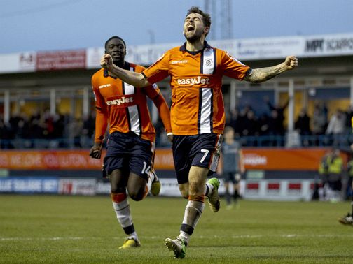 Alex Lawless celebrates the crucial goal