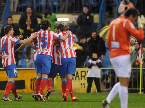 Atletico Madrid celebrate Koke's goal.