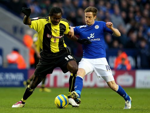 Calvin Zola and Andy King battle for the ball