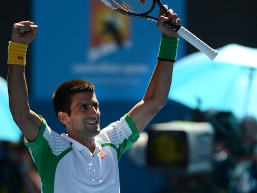Djokovic celebrates his victory over Mathieu
