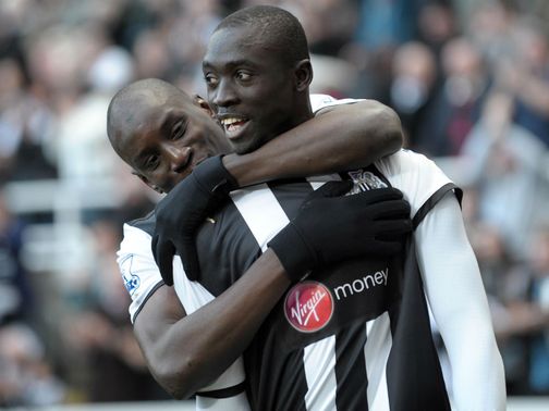 Papiss Cisse (r) takes over the striking role from Ba at Newcastle