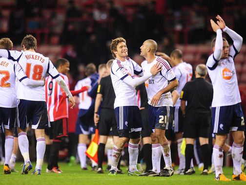 Bolton celebrate their victory at Sunderland