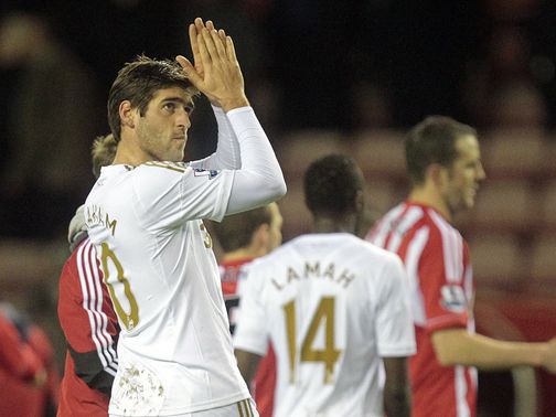 Danny Graham applauds the Swansea fans after a goalless draw at Sunderland&nbsp;