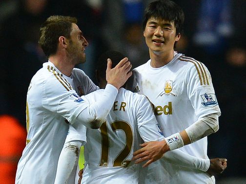 Swansea celebrate reaching the Capital One Cup final