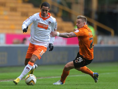 Tom Ince looks to get past Jamie O'Hara
